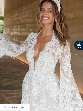 Elegant White Lace Wedding Dress with Plunge Neckline